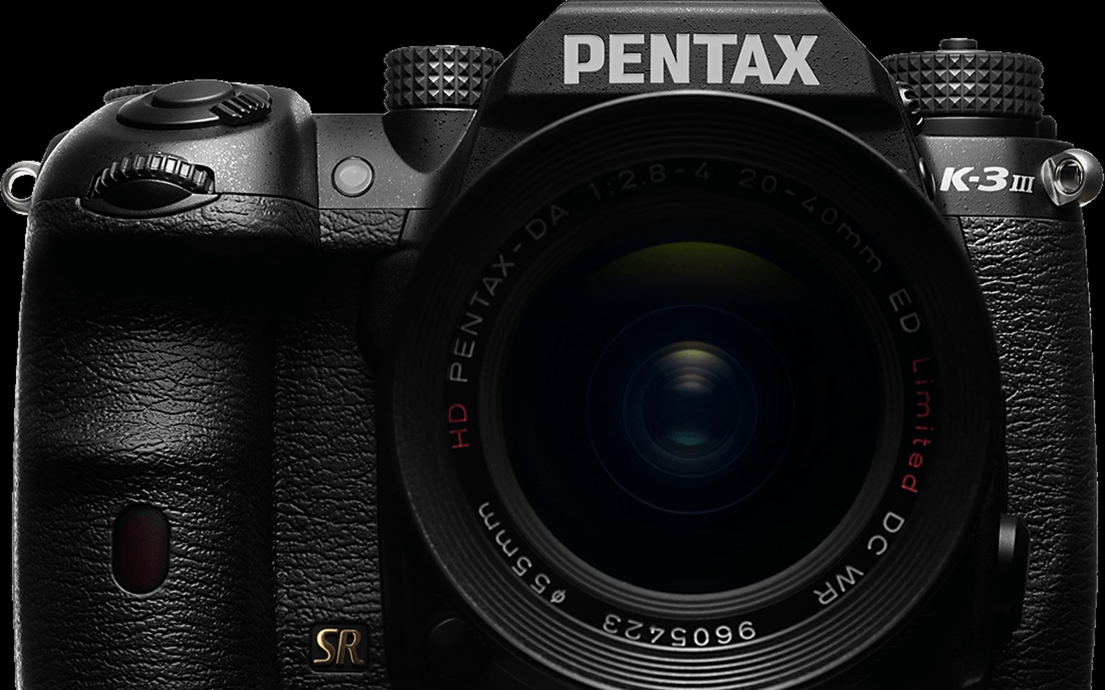 Close-up of a Pentax K-3 III camera body with attached zoom lens
