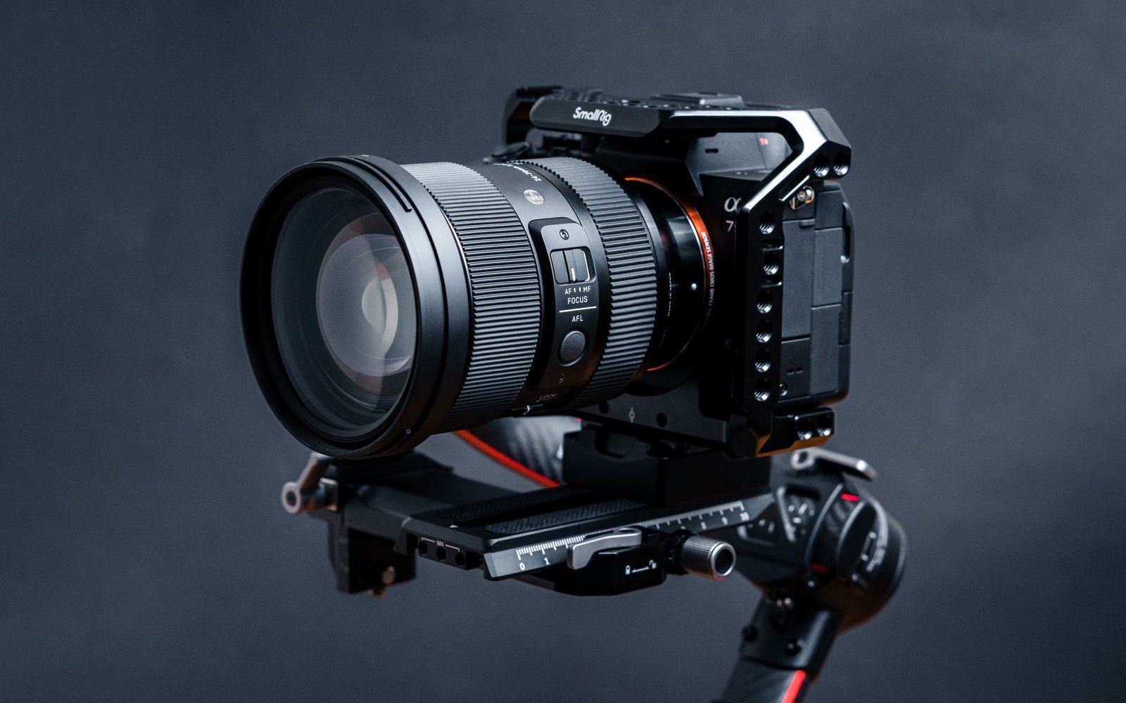Sony alpha camera in a SmallRig cage with a large zoom lens, mounted on a gimbal